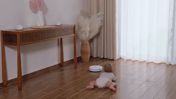 gif of a toddler chasing Eco Hoover